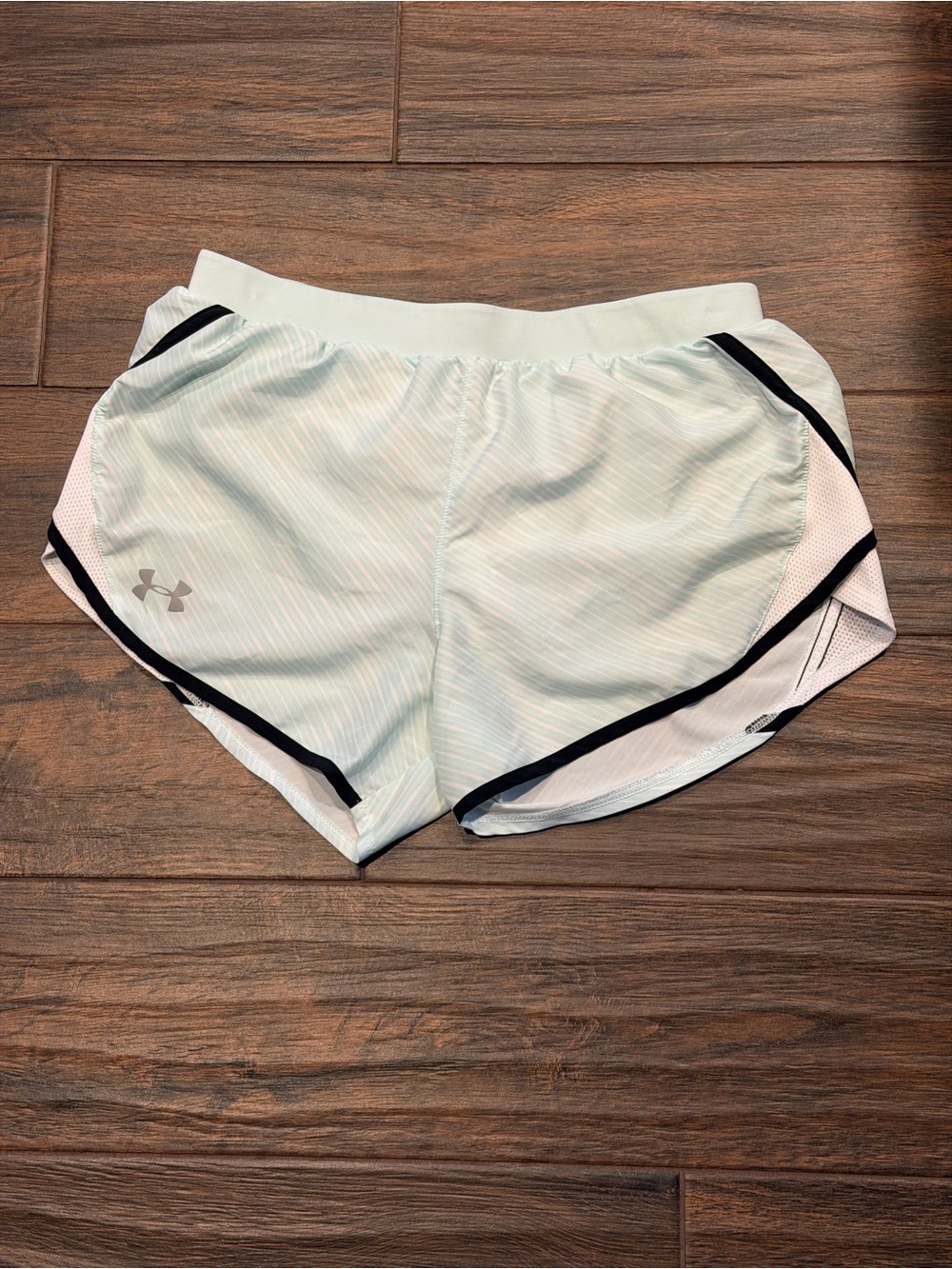 Under Armour Women's light blue Athletic Shorts with Black Trim, size S running